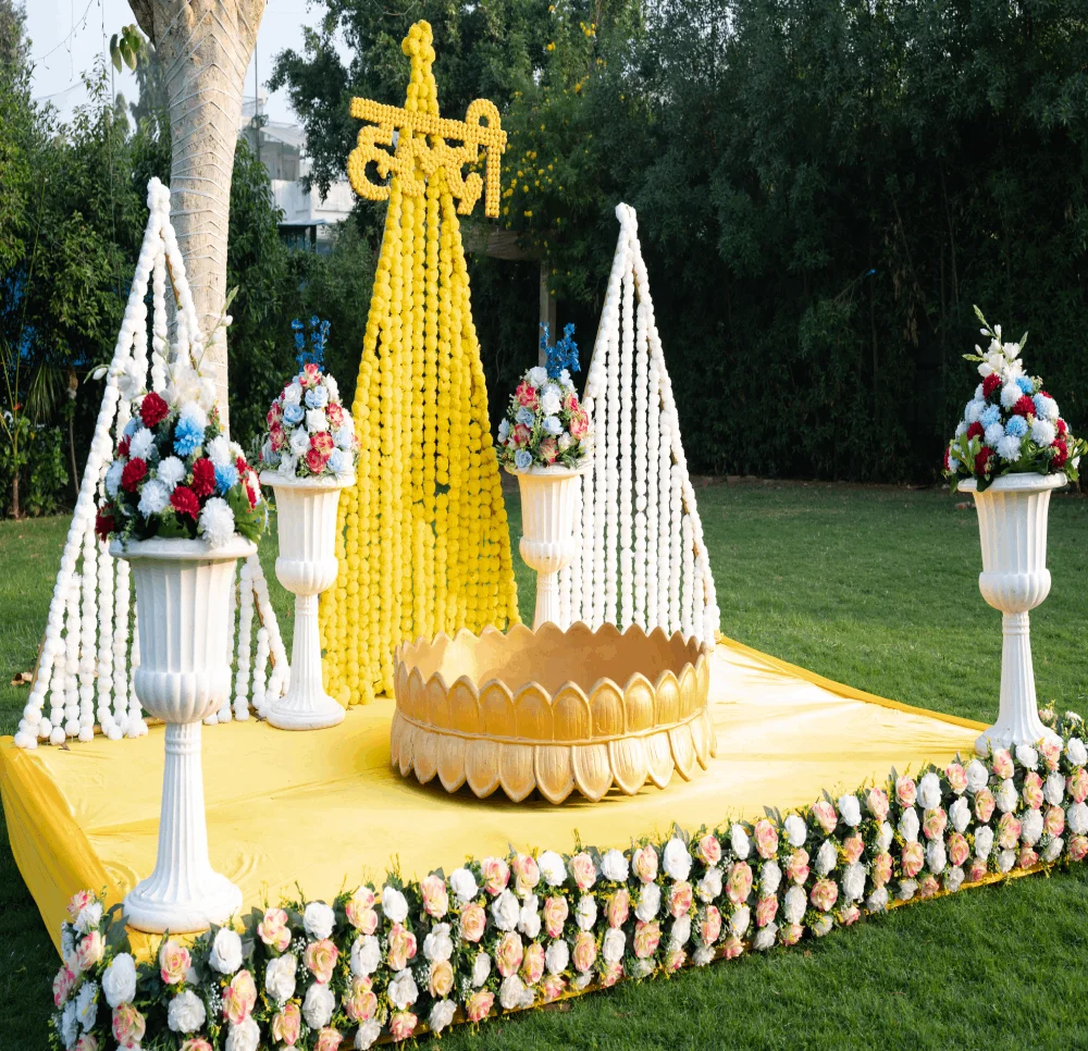 Yellow floral haldi decoration from the existing website